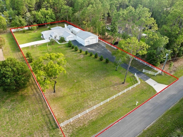 15430 Oakcrest Cir, Brooksville, FL 34604 - view from above of property featuring property boundaries highlighted and a heavily wooded area