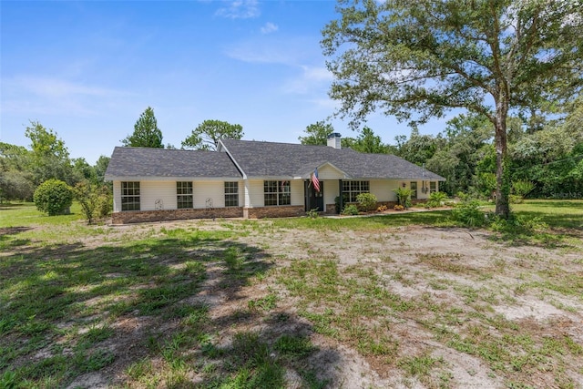 14645 Spellman Ct, Spring Hill, FL 34610 - single story home featuring a chimney