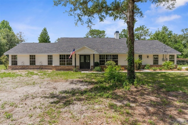 14645 Spellman Ct, Spring Hill, FL 34610 - ranch-style house featuring a chimney