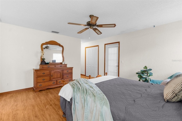 14645 Spellman Ct, Spring Hill, FL 34610 - bedroom featuring light wood-type flooring and a ceiling fan