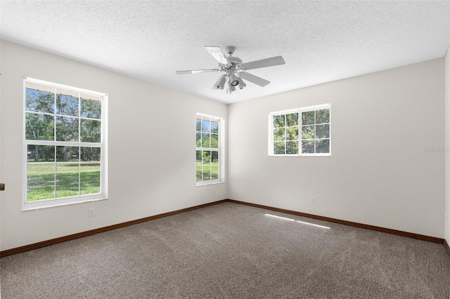 14645 Spellman Ct, Spring Hill, FL 34610 - spare room featuring carpet flooring, a textured ceiling, and a ceiling fan