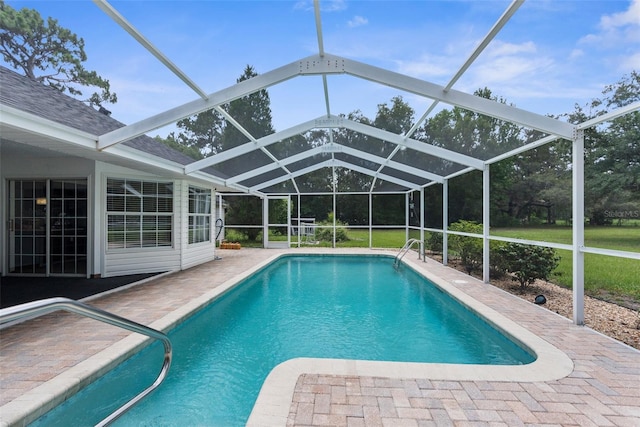 14645 Spellman Ct, Spring Hill, FL 34610 - outdoor pool with a patio area and glass enclosure
