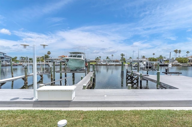 3701 Corsair Ct, New Port Richey, FL 34652 - dock area featuring boat lift and a water view