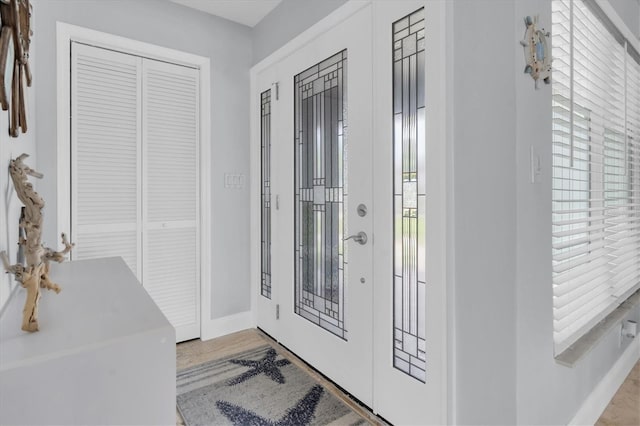 3701 Corsair Ct, New Port Richey, FL 34652 - foyer entrance featuring baseboards
