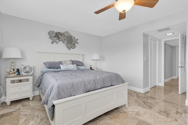 3701 Corsair Ct, New Port Richey, FL 34652 - bedroom with light marble finish flooring and ceiling fan