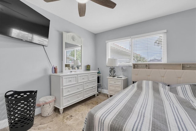 3701 Corsair Ct, New Port Richey, FL 34652 - bedroom with baseboards and ceiling fan
