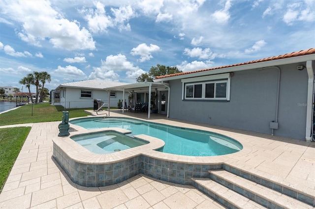 3701 Corsair Ct, New Port Richey, FL 34652 - view of pool with a patio area and a pool with connected hot tub