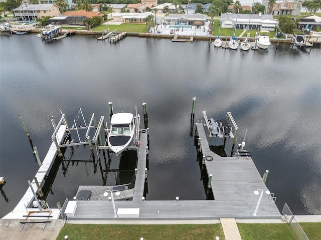 3701 Corsair Ct, New Port Richey, FL 34652 - dock with boat lift and a water view