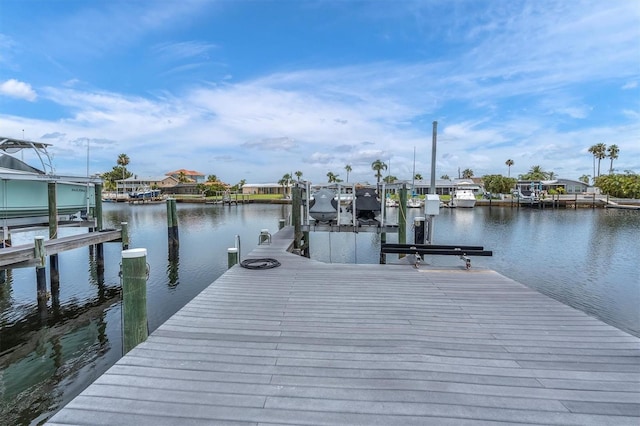 3701 Corsair Ct, New Port Richey, FL 34652 - dock with boat lift and a water view