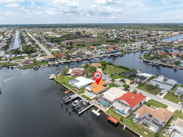 3701 Corsair Ct, New Port Richey, FL 34652 - aerial perspective of suburban area with a nearby body of water
