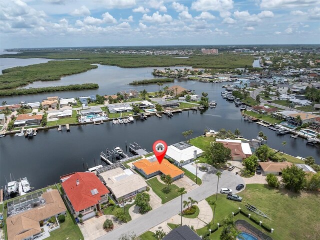 3701 Corsair Ct, New Port Richey, FL 34652 - aerial view of residential area with a large body of water