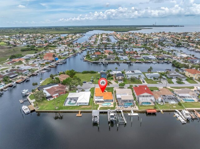 3701 Corsair Ct, New Port Richey, FL 34652 - aerial perspective of suburban area featuring a nearby body of water