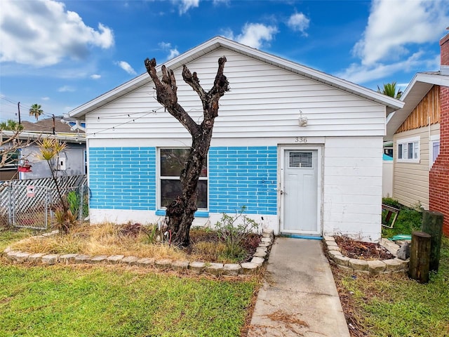 336 Boca Ciega Dr, Madeira Beach, FL 33708 - view of front facade with brick siding