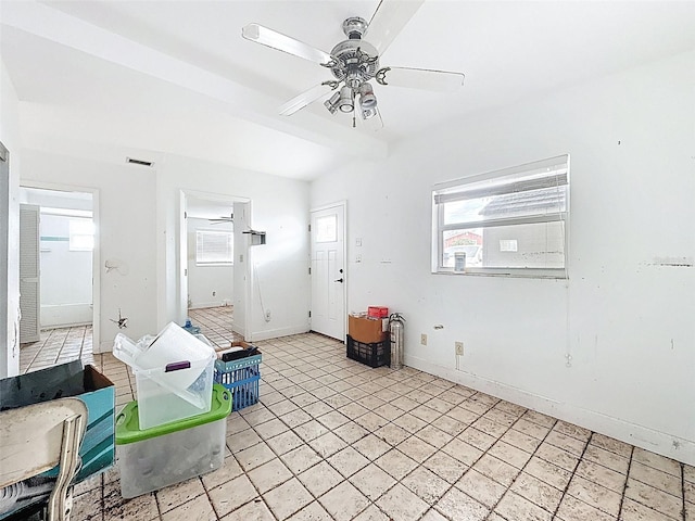 336 Boca Ciega Dr, Madeira Beach, FL 33708 - interior space featuring a ceiling fan and baseboards