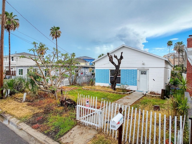 336 Boca Ciega Dr, Madeira Beach, FL 33708 - view of front facade featuring a fenced front yard