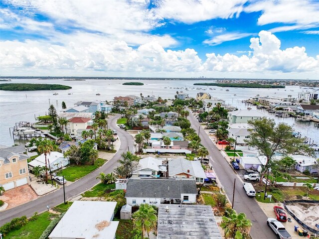 336 Boca Ciega Dr, Madeira Beach, FL 33708 - aerial perspective of suburban area featuring a large body of water