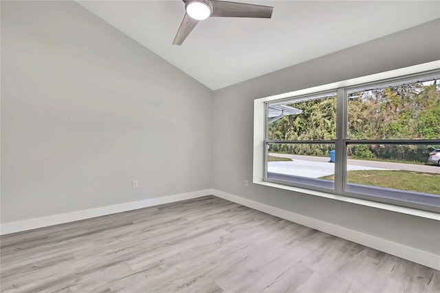 4360 Talco Ave, Spring Hill, FL 34609 - unfurnished room with vaulted ceiling, a ceiling fan, and wood finished floors