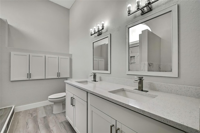4360 Talco Ave, Spring Hill, FL 34609 - bathroom with double vanity and wood finished floors