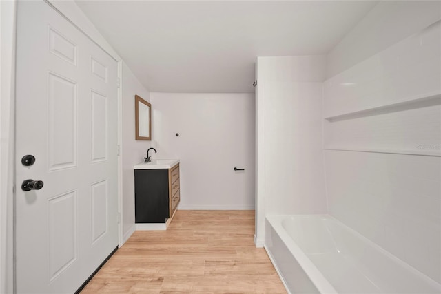 4622 Paloverde Dr, New Port Richey, FL 34652 - bathroom featuring vanity and wood finished floors