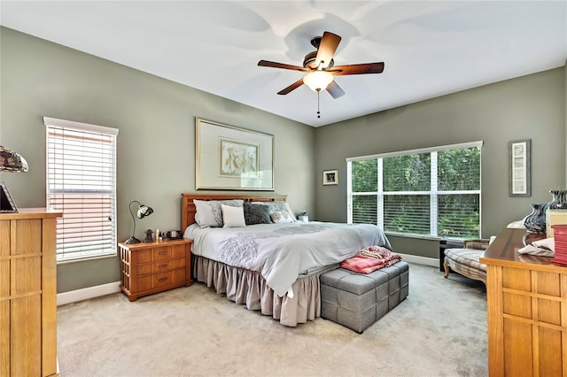 11101 Ragsdale Ct, New Port Richey, FL 34654 - bedroom featuring light carpet and a ceiling fan