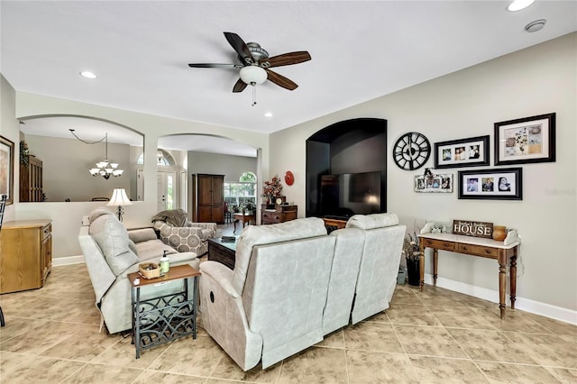 11101 Ragsdale Ct, New Port Richey, FL 34654 - living area featuring arched walkways, a ceiling fan, light tile patterned floors, and recessed lighting