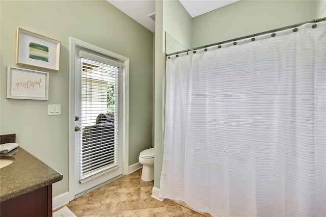 11101 Ragsdale Ct, New Port Richey, FL 34654 - full bathroom featuring vanity, curtained shower, and tile patterned flooring