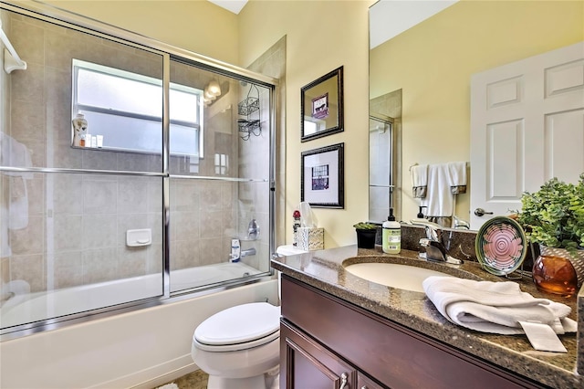 11101 Ragsdale Ct, New Port Richey, FL 34654 - full bathroom featuring vanity and combined bath / shower with glass door