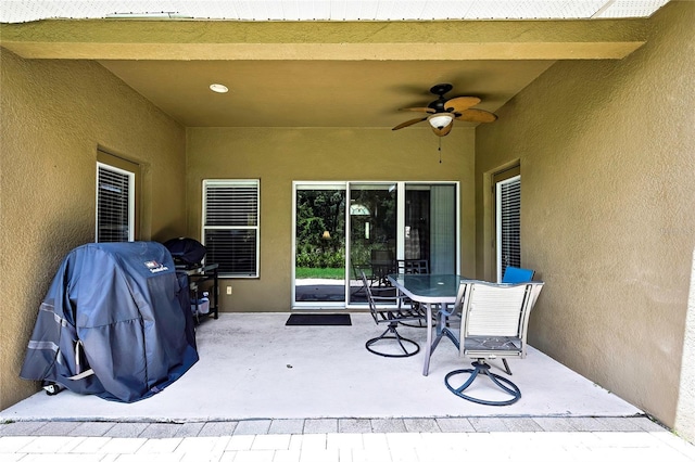 11101 Ragsdale Ct, New Port Richey, FL 34654 - view of patio featuring ceiling fan and grilling area