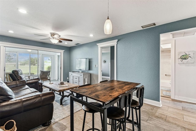 3745 Teeside Dr Unit 3745, New Port Richey, FL 34655 - living area with a textured wall, ceiling fan, recessed lighting, and wood tiled floors