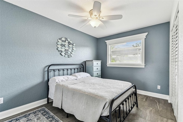 3745 Teeside Dr Unit 3745, New Port Richey, FL 34655 - bedroom with a ceiling fan and a textured wall