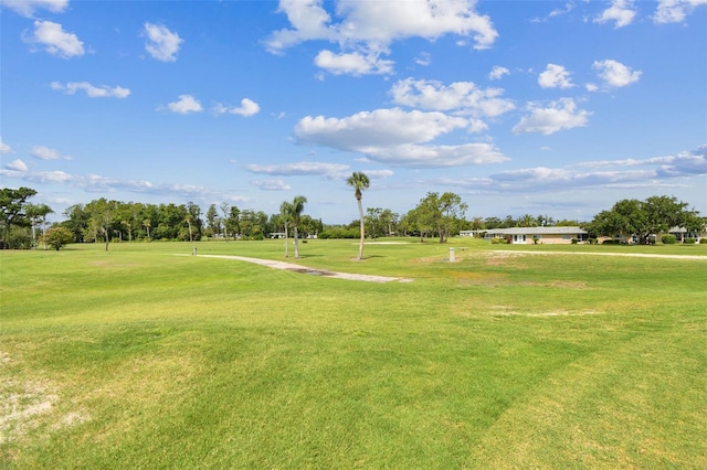 3745 Teeside Dr Unit 3745, New Port Richey, FL 34655 - surrounding community featuring a lawn and golf course view