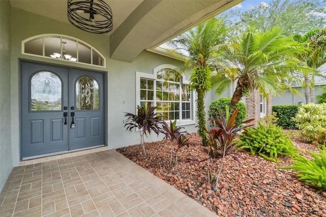2519 Shipston Ave, New Port Richey, FL 34655 - view of exterior entry with stucco siding