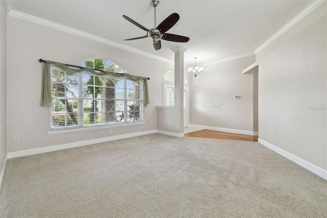 2519 Shipston Ave, New Port Richey, FL 34655 - spare room featuring crown molding, a chandelier, carpet, and a ceiling fan