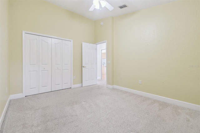 2519 Shipston Ave, New Port Richey, FL 34655 - unfurnished bedroom with carpet floors, a closet, and a ceiling fan