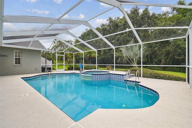 2519 Shipston Ave, New Port Richey, FL 34655 - view of swimming pool with a patio, a pool with connected hot tub, and glass enclosure