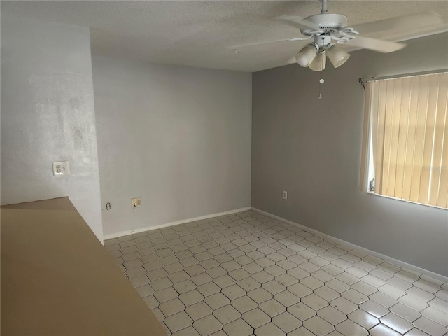 7338 Foxbloom Dr, Port Richey, FL 34668 - spare room featuring ceiling fan and baseboards