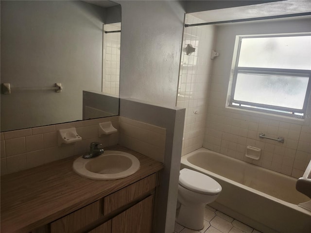 7338 Foxbloom Dr, Port Richey, FL 34668 - full bath with vanity, tasteful backsplash, tile patterned floors, and shower / washtub combination