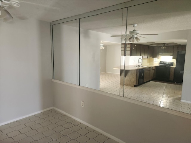 7338 Foxbloom Dr, Port Richey, FL 34668 - empty room featuring a ceiling fan and light tile patterned floors