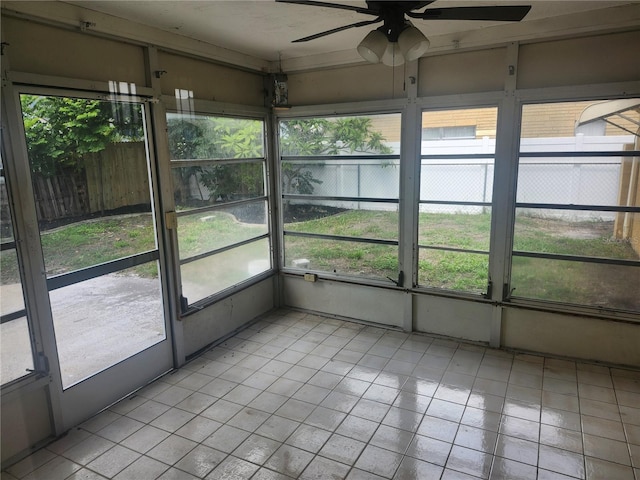 7338 Foxbloom Dr, Port Richey, FL 34668 - unfurnished sunroom with ceiling fan