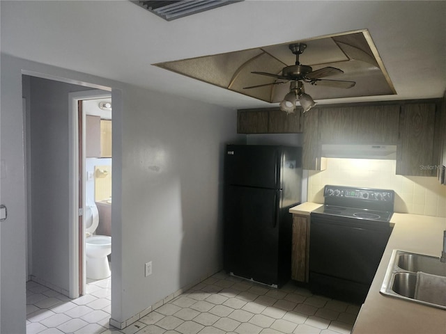 7338 Foxbloom Dr, Port Richey, FL 34668 - kitchen featuring freestanding refrigerator, electric range oven, extractor fan, ceiling fan, and light countertops