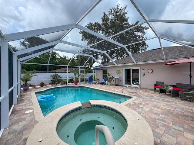 9431 Spring Hill Dr, Spring Hill, FL 34608 - view of swimming pool with a patio, a fenced backyard, a pool with connected hot tub, and glass enclosure