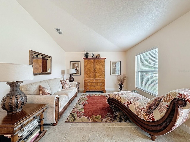 9431 Spring Hill Dr, Spring Hill, FL 34608 - living area with vaulted ceiling and baseboards