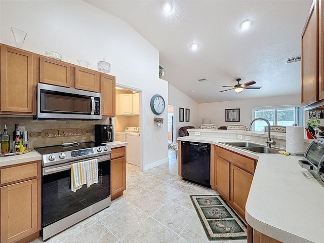 9431 Spring Hill Dr, Spring Hill, FL 34608 - kitchen featuring stainless steel appliances, vaulted ceiling, washer and dryer, tasteful backsplash, and a ceiling fan