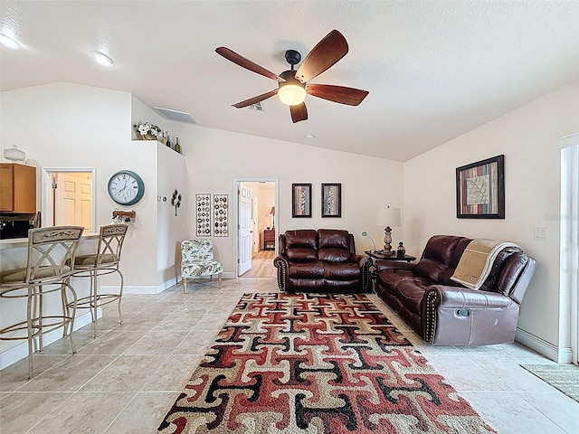 9431 Spring Hill Dr, Spring Hill, FL 34608 - living area with lofted ceiling, ceiling fan, and light tile patterned flooring