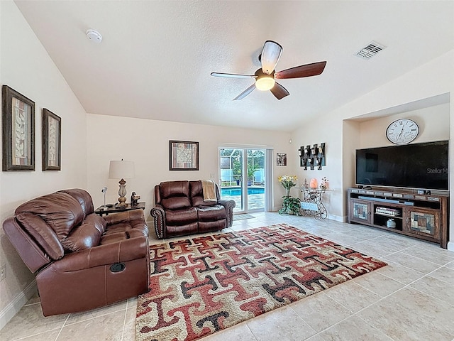 9431 Spring Hill Dr, Spring Hill, FL 34608 - living area with lofted ceiling, ceiling fan, and tile patterned floors