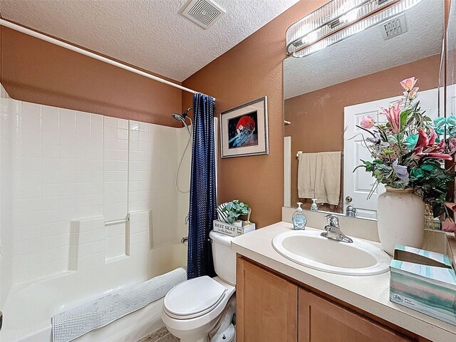 9431 Spring Hill Dr, Spring Hill, FL 34608 - bathroom with a textured ceiling, shower / bathtub combination with curtain, vanity, and a textured wall