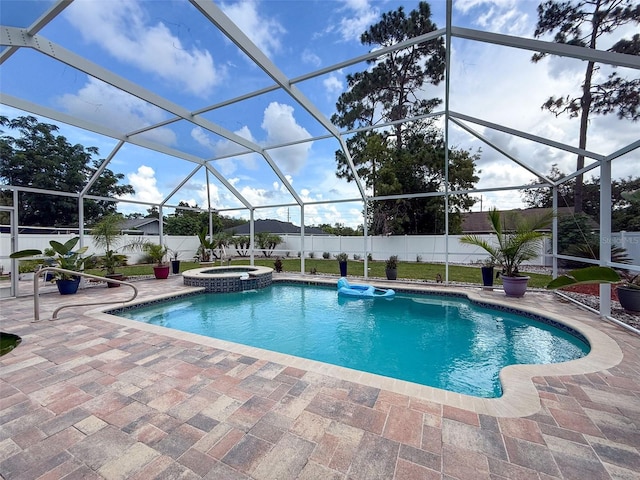 9431 Spring Hill Dr, Spring Hill, FL 34608 - view of pool featuring a fenced backyard, a patio area, a pool with connected hot tub, and glass enclosure