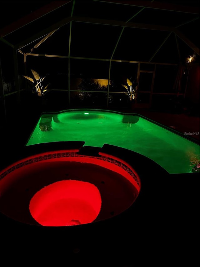 9431 Spring Hill Dr, Spring Hill, FL 34608 - view of pool with a pool with connected hot tub