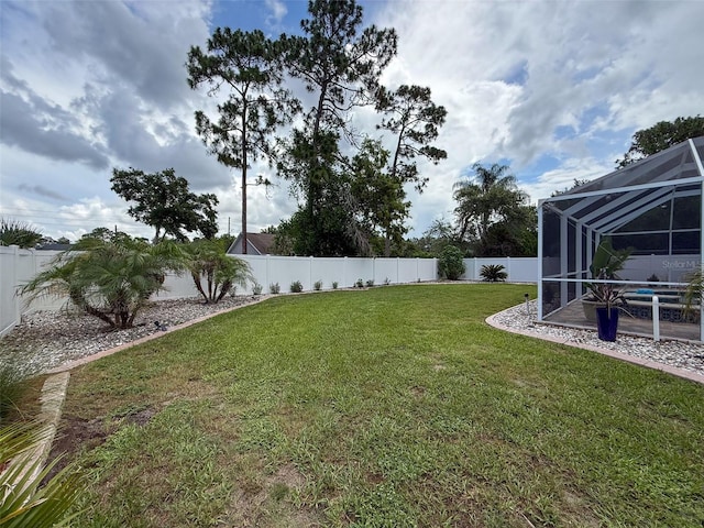 9431 Spring Hill Dr, Spring Hill, FL 34608 - fenced backyard with glass enclosure