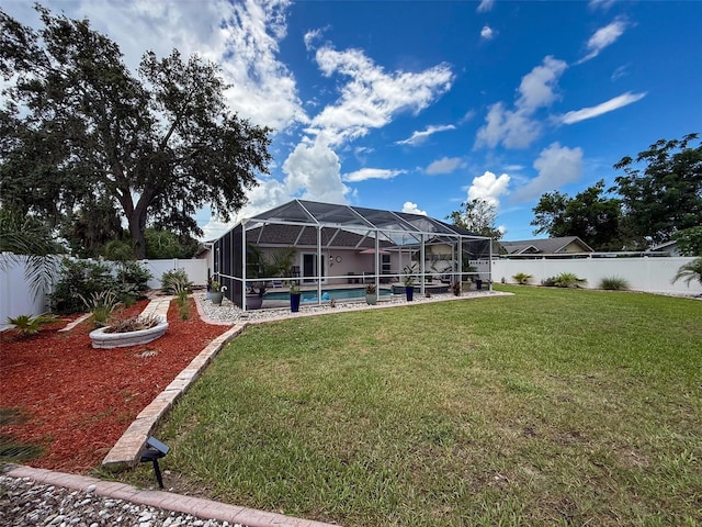 9431 Spring Hill Dr, Spring Hill, FL 34608 - fenced backyard with a lanai